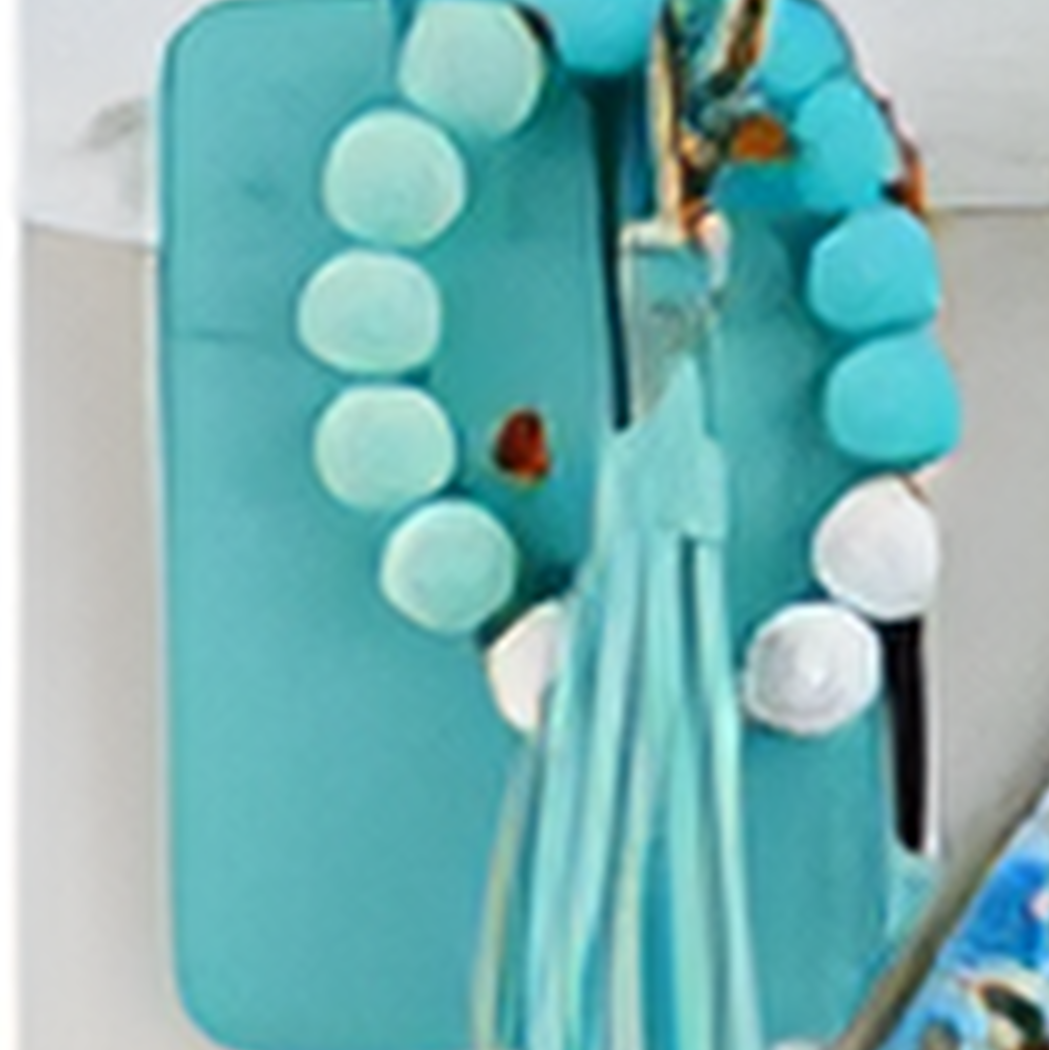 Teal beaded wrislet wallet